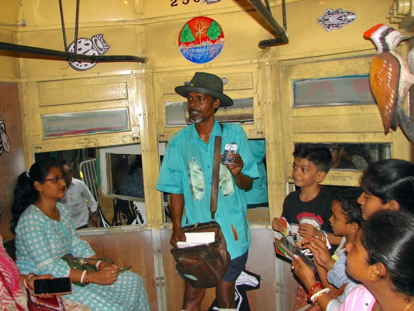 9-Sajal%20conducting%20on%20the%20Sundarban%20Tramjatra%20tram_600px-width