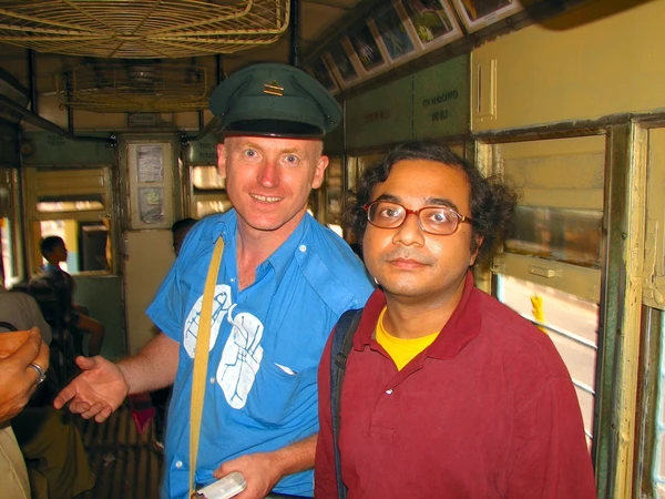1b-2012%20Anurag%20and%20Craig%20Paribeshbandhu%20tramjatra_600px-width